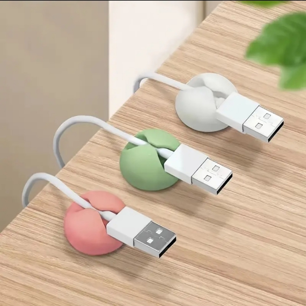 Adhesive cord holder